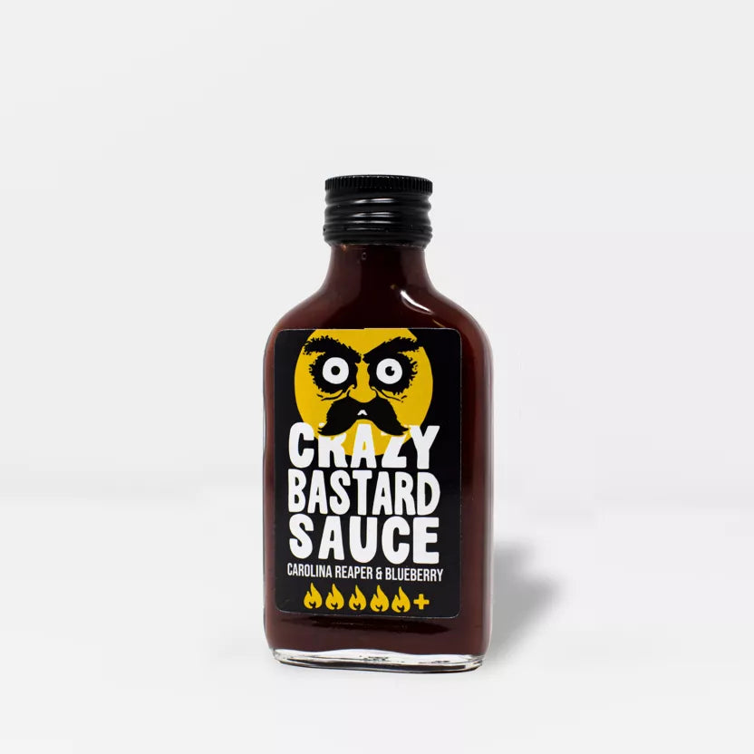 Crazy Bastard aštrus padažas - Carolina Reaper ir mėlynių 100ml – priekinis vaizdas | Beata Nicholson