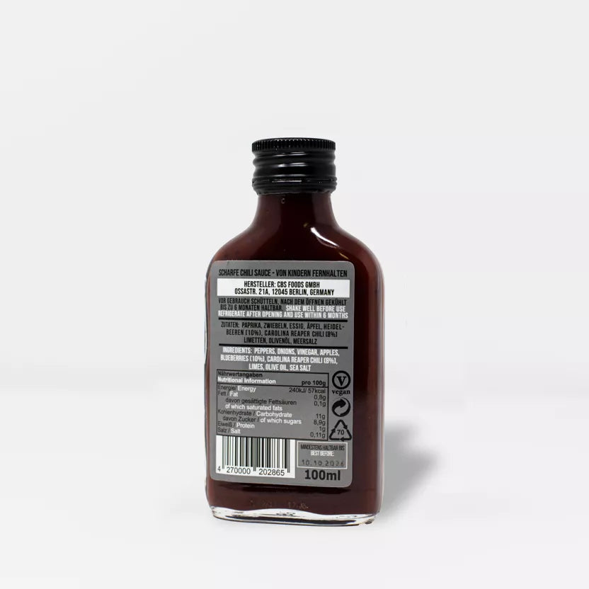 Crazy Bastard aštrus padažas - Carolina Reaper ir mėlynių 100ml – šoninis vaizdas | Beata Nicholson