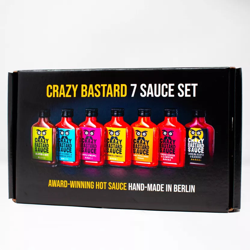 „Crazy Bastard“ aštrių padažų  rinkinys, 7 vnt. – nuo švelnaus iki labai aštraus, 100 ml x 7 – priekinis vaizdas | Beata Nicholson